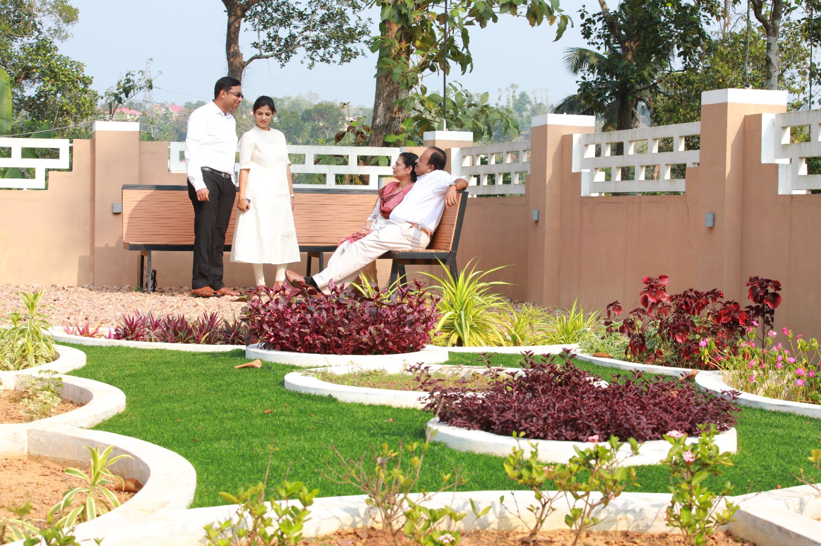Family spending time with elders in the garden